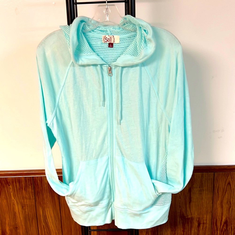 Woman’s Aqua blue zip up hoodie.